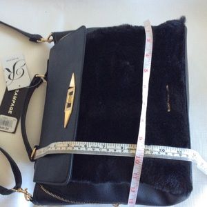 Rampage Women’s faux fur satchel